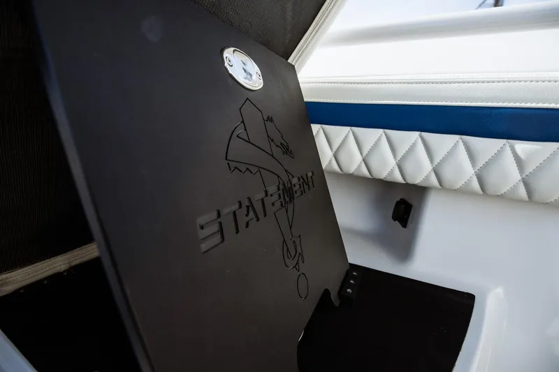 Slide: The Image of Interior detail of 2026 Statement 350 Open boat with logo and quilted upholstery. - 24