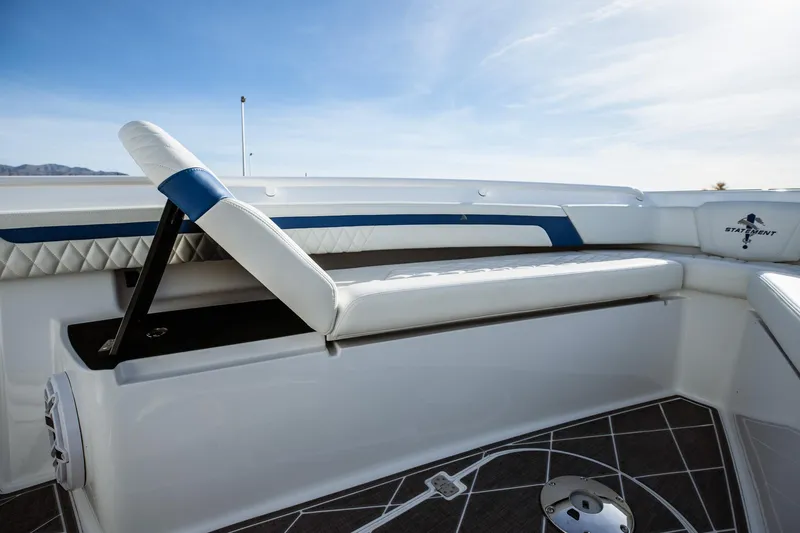 Slide: The Image of Luxury seating on 2026 Statement 350 Open boat, featuring elegant white and blue upholstery. - 25