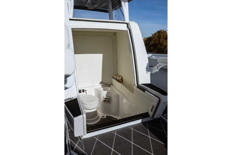 Slide: The Image of Interior view of 2026 Statement 350 Open boat's compact bathroom. - 29