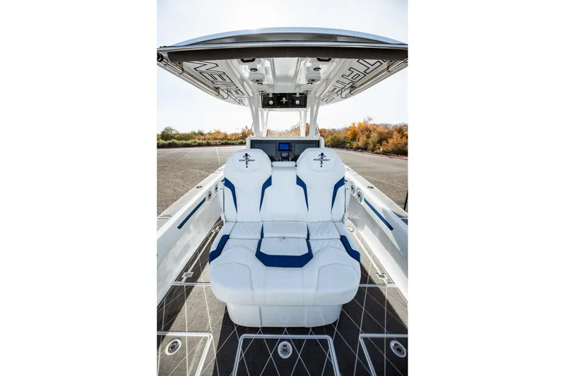 Slide: The Image of 2026 Statement 350 Open boat interior with white and blue seating, showcasing luxury design. - 32