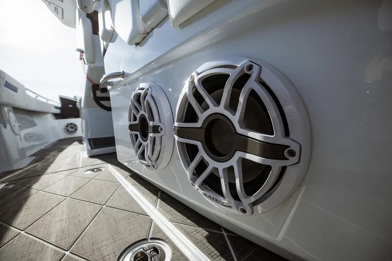 Slide: The Image of 2026 Statement 350 Open boat with sleek audio speakers on deck. - 35