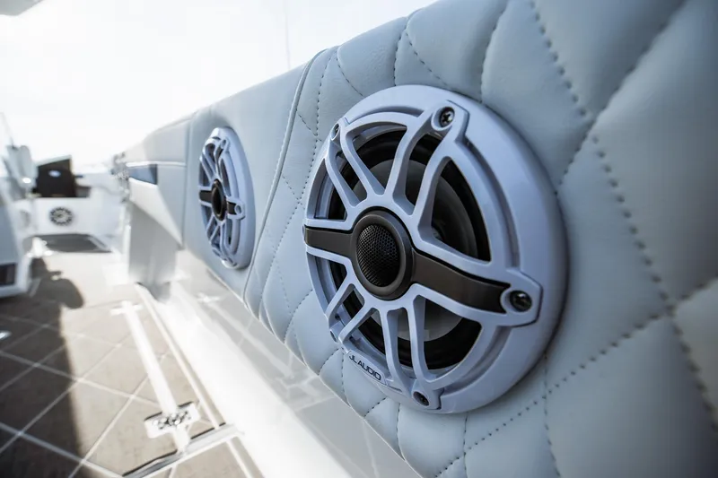 Slide: The Image of Close-up of marine speakers on a 2026 Statement 350 Open boat interior. - 36