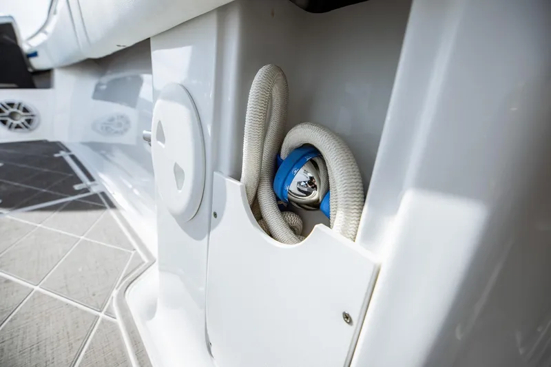 Slide: The Image of 2026 Statement 350 Open boat interior with coiled rope and storage compartment. - 41