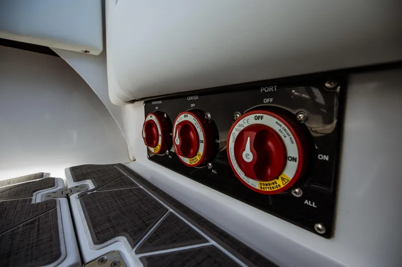 Slide: The Image of Control panel with red switches on 2026 Statement 350 Open boat. - 42
