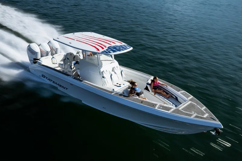 Slide: The Image of 2026 Statement 350 Open boat speeding on water, featuring American flag design. - 8