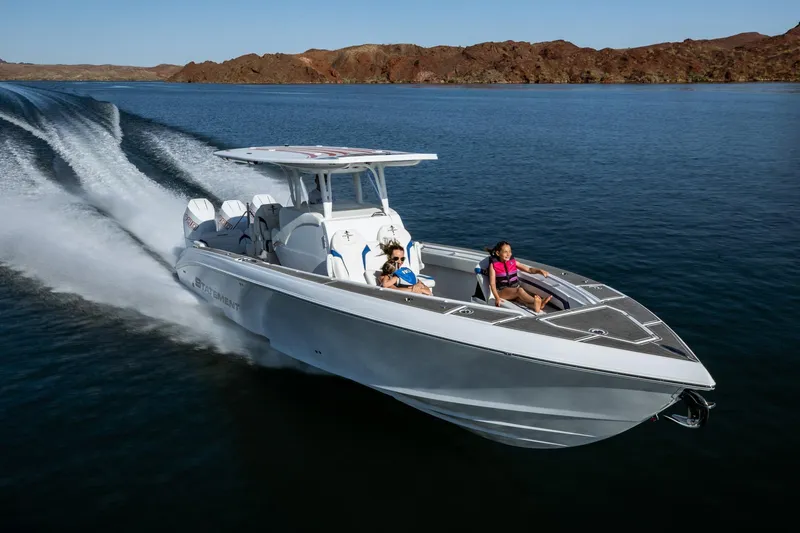 Slide: The Image of 2026 Statement 350 Open boat cruising on a serene lake with passengers enjoying the ride. - 9