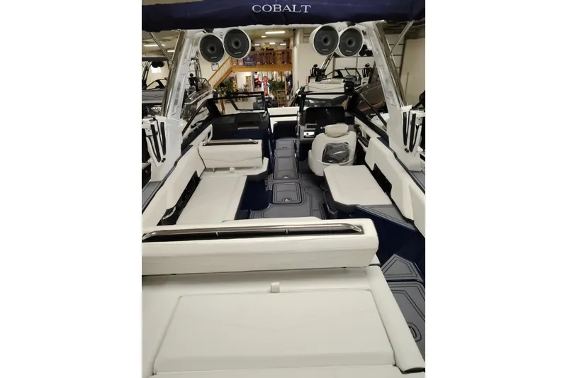 Slide: The Image of 2026 Cobalt R6 Surf boat interior with luxurious seating and advanced audio system. - 21