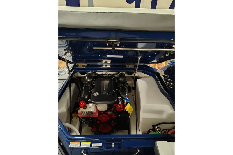 Slide: The Image of 2026 Cobalt R6 Surf boat engine compartment, showcasing a powerful inboard motor. - 25