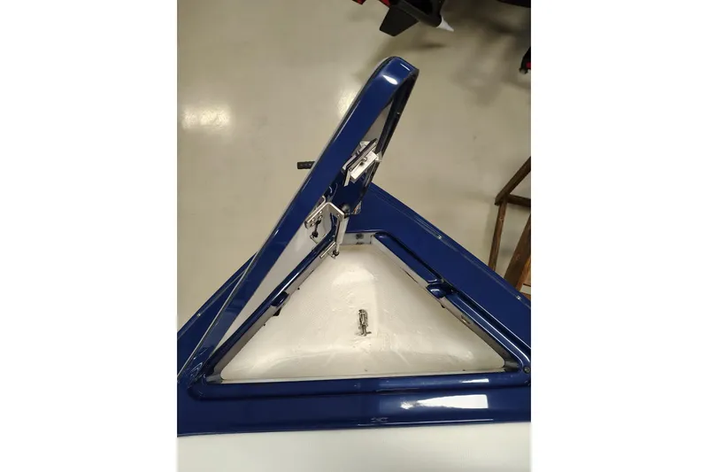 Slide: The Image of Open hatch of 2026 Cobalt R6 Surf boat, showcasing interior storage space. - 7