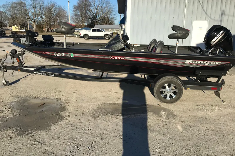 The Image of 2018 Ranger RT178 fishing boat on trailer, parked outdoors. - 1