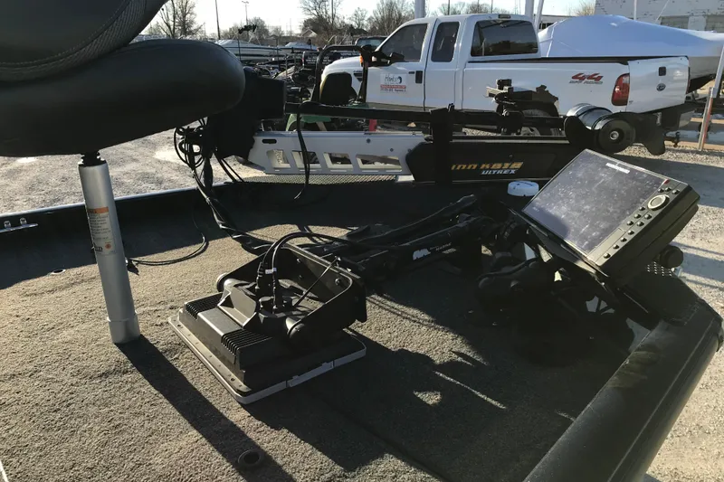 Slide: The Image of 2018 Ranger RT178 boat interior with fishing seat and electronic equipment. - 4