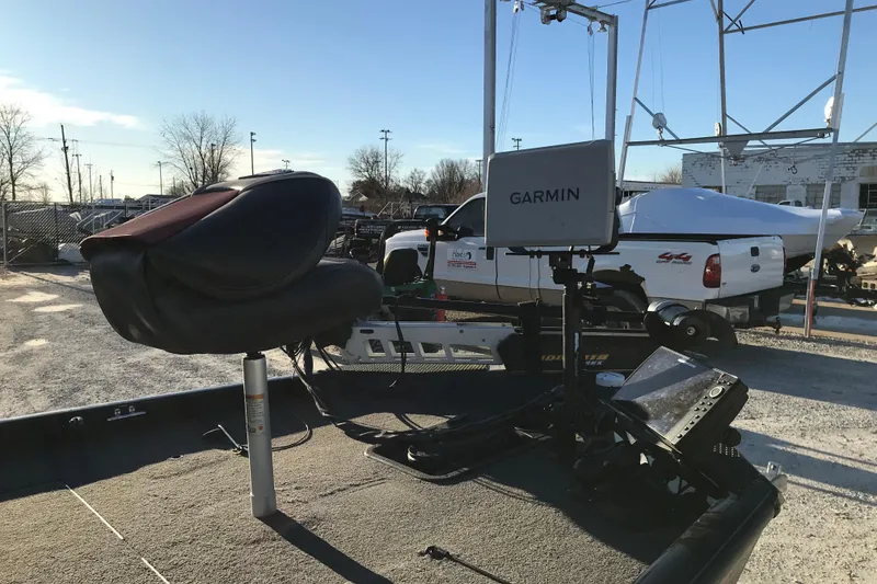Slide: The Image of 2018 Ranger RT178 boat with Garmin equipment, parked outdoors in a sunny setting. - 5