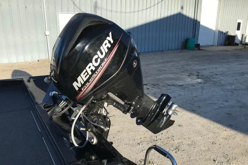 Slide: The Image of 2018 Ranger RT178 boat with Mercury FourStroke outboard motor in a sunny outdoor setting. - 8