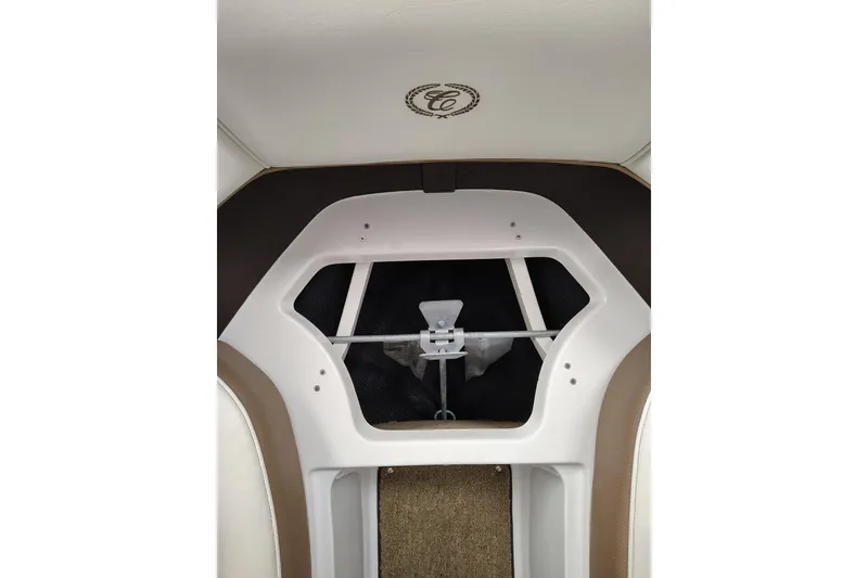 Slide: The Image of Interior view of a 2016 Cobalt 220 boat, featuring a sleek design and logo. - 17