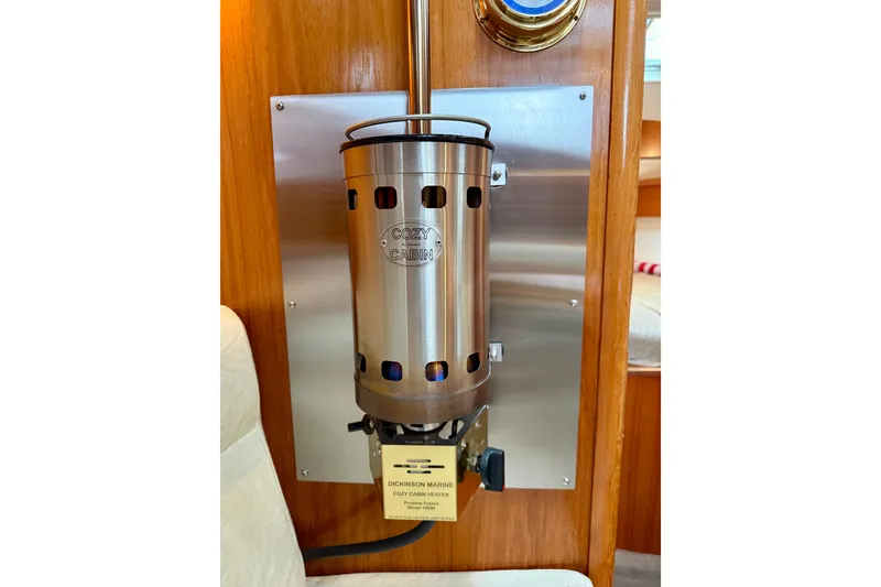 Slide: The Image of Interior of 1997 Jeanneau Sun Odyssey 36.2 yacht with wooden finish and cream sofa. - 18