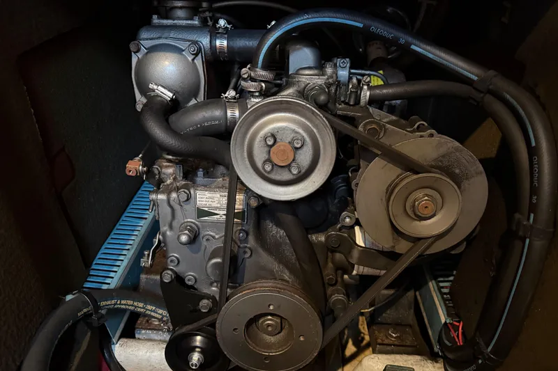 Slide: The Image of Cozy interior of 1997 Jeanneau Sun Odyssey 36.2 sailboat with wooden finishes and seating area. - 26