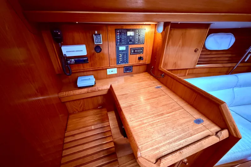 Slide: The Image of Compact bathroom in 1997 Jeanneau Sun Odyssey 36.2 sailboat with sink and mirror. - 35