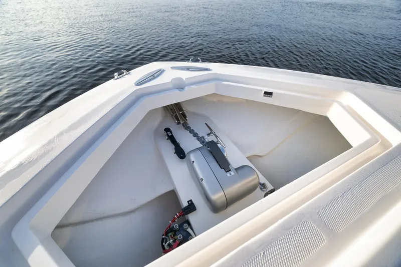 Slide: The Image of 2023 SeaVee 322Z boat anchor compartment with water view. - 17