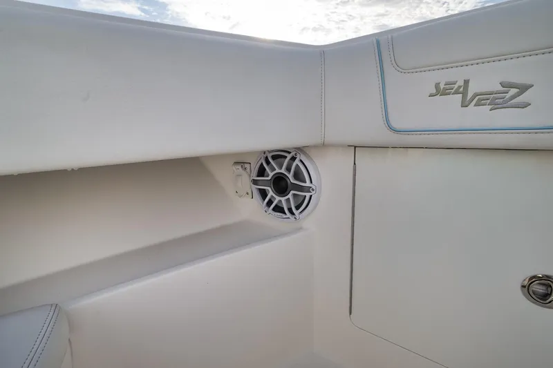 Slide: The Image of 2023 SeaVee 322Z boat interior with speaker and logo detail. - 25