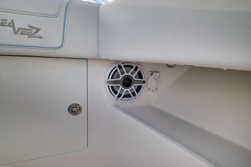 Slide: The Image of 2023 SeaVee 322Z boat interior with speaker and storage compartment. - 26
