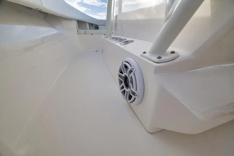 Slide: The Image of 2023 SeaVee 322Z boat interior with speaker and sleek white design. - 27