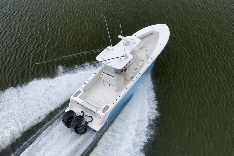 Slide: The Image of 2023 SeaVee 322Z boat cruising on water, aerial view. - 57