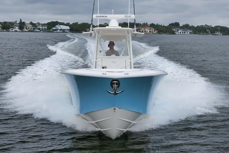 Slide: The Image of 2023 SeaVee 322Z boat cruising on water, showcasing sleek design and powerful performance. - 63