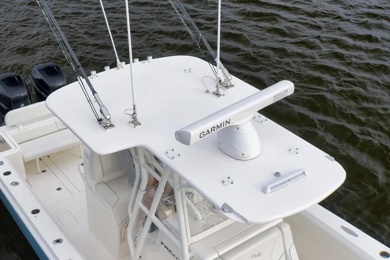 Slide: The Image of 2023 SeaVee 322Z boat with Garmin radar, viewed from above on water. - 9