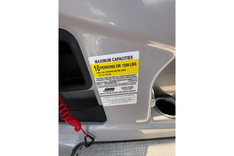 Slide: The Image of 2025 Harris Cruiser 230 capacity label, maximum 10 persons or 1339 lbs. - 8