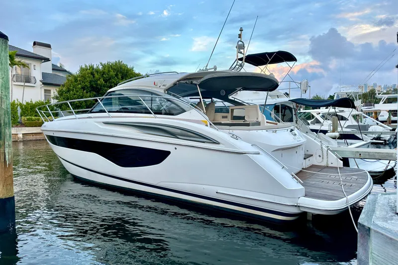 The Image of 2021 Princess V40 yacht cruising on open water, showcasing sleek design and performance. - 0