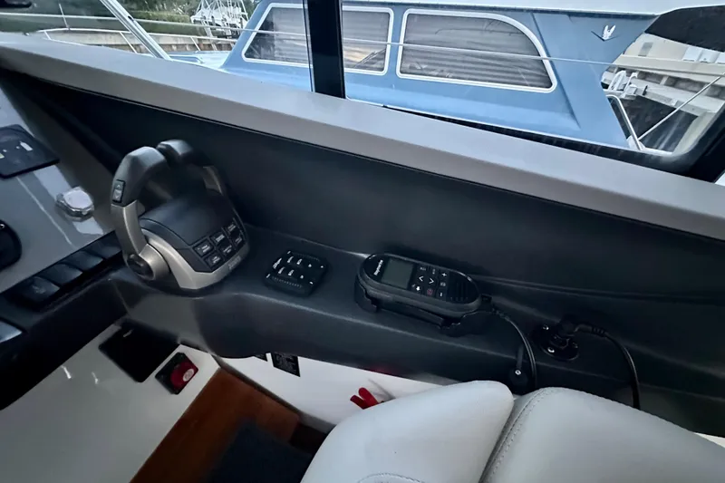 Slide: The Image of Outdoor kitchenette on 2021 Princess V40 yacht with sink and grill, overlooking water. - 15