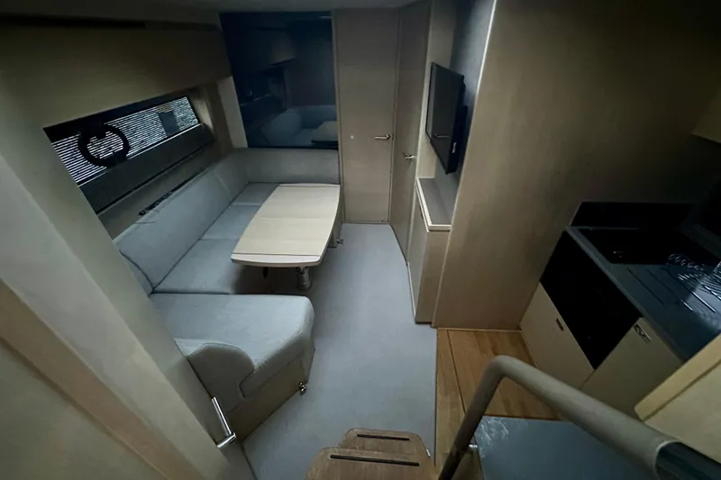 Slide: The Image of Interior of 2021 Princess V40 yacht with modern navigation system and luxurious seating. - 19
