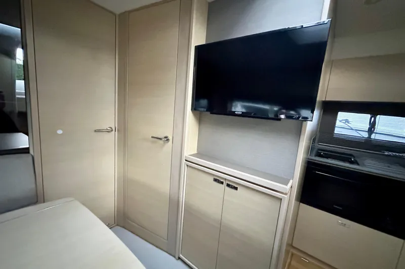 Slide: The Image of Interior view of 2021 Princess V40 yacht cockpit with modern navigation equipment. - 20