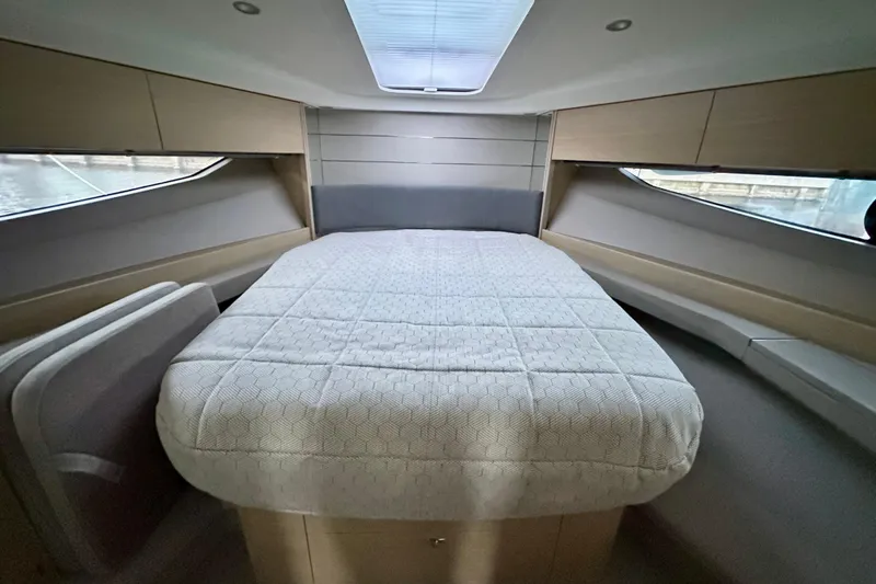 Slide: The Image of Modern interior of 2021 Princess V40 yacht with kitchen and seating area. - 21