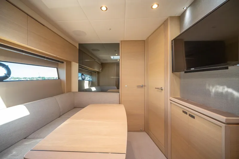 Slide: The Image of Luxurious interior of 2021 Princess V40 yacht with modern furnishings and wall-mounted TV. - 23