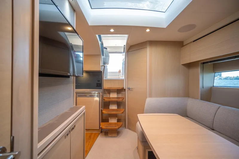 Slide: The Image of Interior of 2021 Princess V40 yacht with modern design and natural lighting. - 30