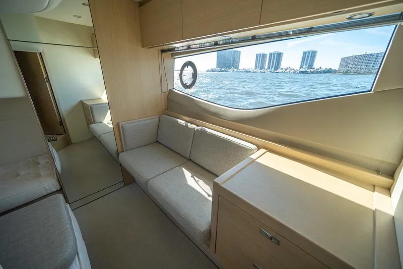 Slide: The Image of Interior of 2021 Princess V40 yacht with modern furnishings and ocean view. - 36