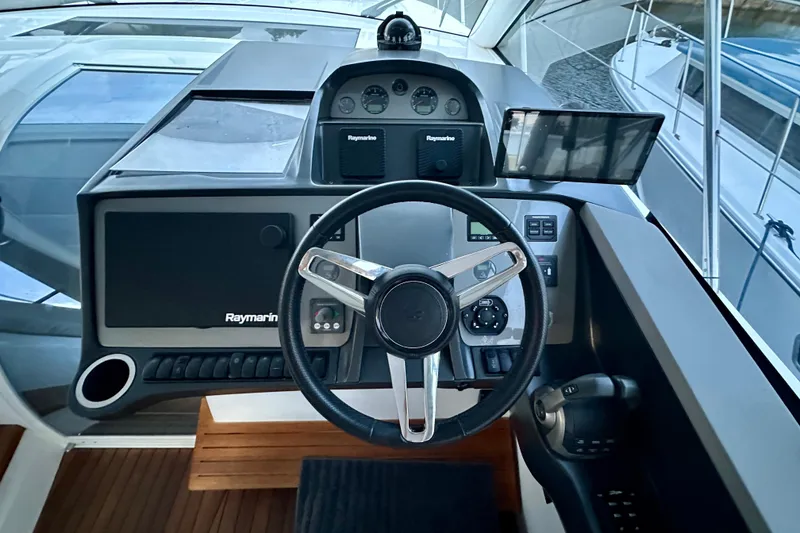 Slide: The Image of Luxurious interior of 2021 Princess V40 yacht with modern seating and skylight. - 4