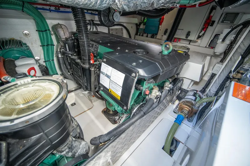 Slide: The Image of Engine room of a 2021 Princess V40 yacht, showcasing detailed mechanical components. - 40