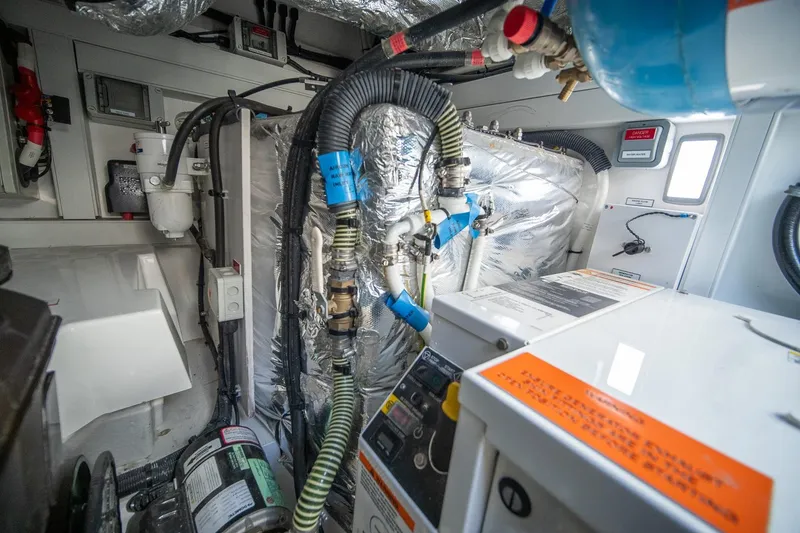 Slide: The Image of Engine room of 2021 Princess V40 yacht with complex piping and machinery. - 45