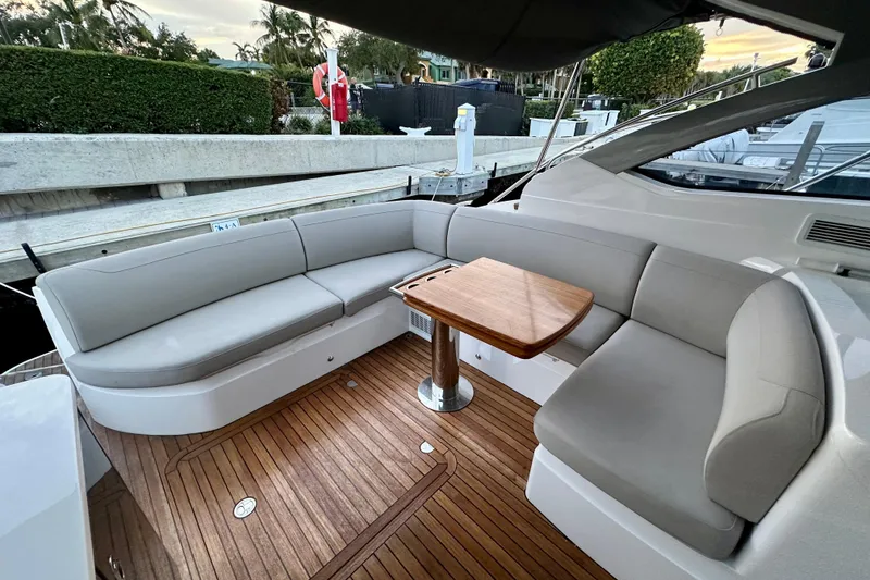 Slide: The Image of Luxurious 2021 Princess V40 yacht with spacious deck, cruising on a sunny day. - 8