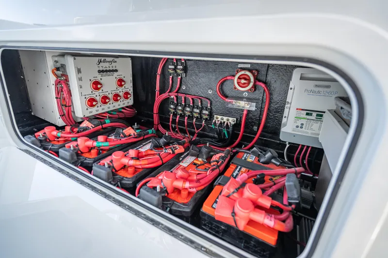 Slide: The Image of Electrical system of 2025 Yellowfin 42 Offshore boat, featuring batteries and wiring. - 41