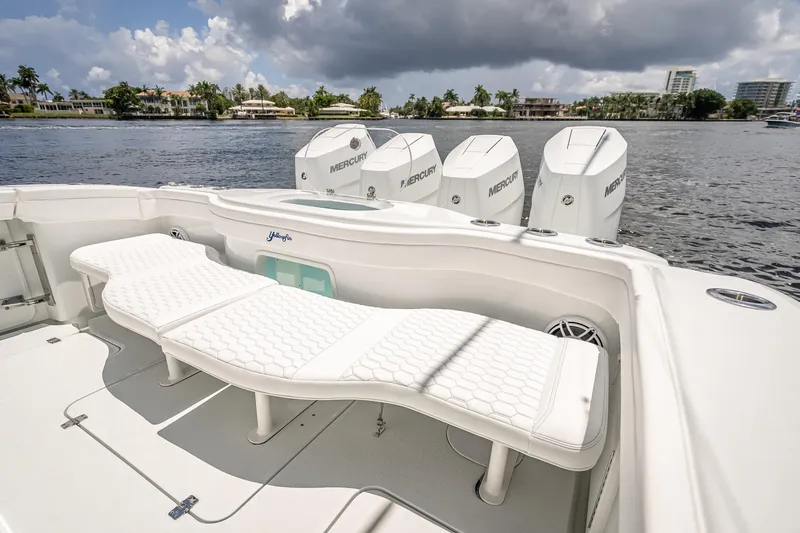 Slide: The Image of 2025 Yellowfin 42 Offshore boat with luxurious seating and powerful Mercury engines. - 55