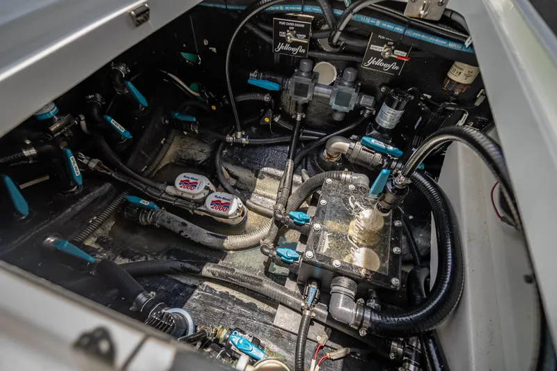 Slide: The Image of Engine compartment of 2025 Yellowfin 42 Offshore boat, showcasing intricate mechanical components. - 60