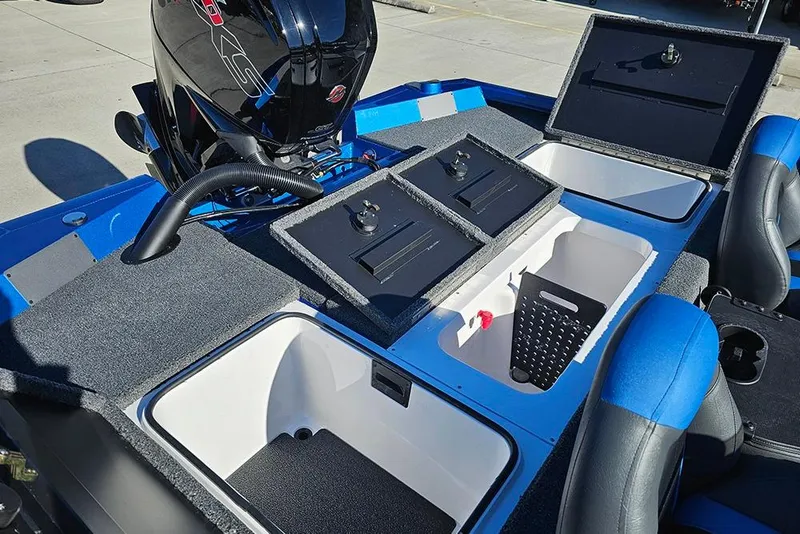 Slide: The Image of 2026 Vexus AVX1880 boat interior with open storage compartments and motor. - 11