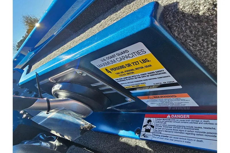 Slide: The Image of 2026 Vexus AVX1880 boat capacity and safety warning labels close-up. - 14