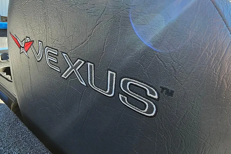 Slide: The Image of 2026 Vexus AVX1880 boat seat with logo, featuring textured black upholstery. - 15