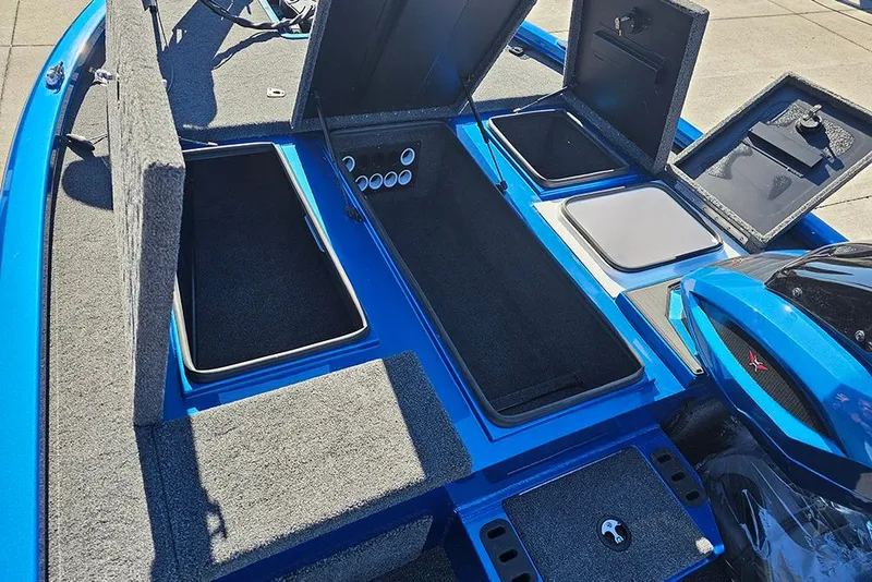 Slide: The Image of 2026 Vexus AVX1880 boat with open storage compartments, showcasing interior design. - 23