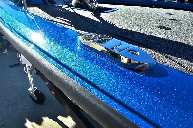 Slide: The Image of 2026 Vexus AVX1880 boat with shiny blue finish and chrome details. - 29