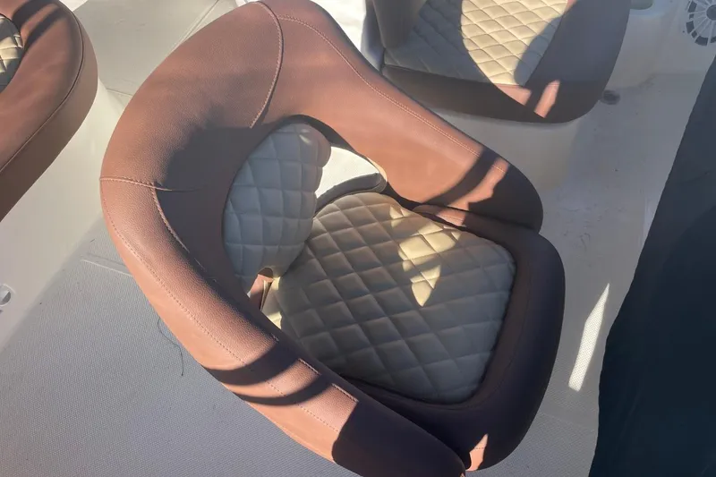 Slide: The Image of Brown and beige quilted seat on 2004 Meridian 459 Motoryacht. - 10